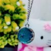 cosmic-crescent-resin-pendant-chain