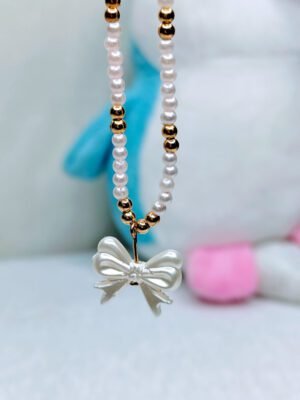 petite-pearl-bow-charm-necklace