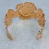 flora-grande-polished-gold-flower-cuff
