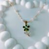emerald-bloom-flower-pearl-chain-necklace