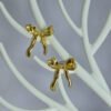 flowing-gold-tone-bow-stud-earrings