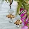 stacked-ornate-pearl-gold-blossom-drop-earrings